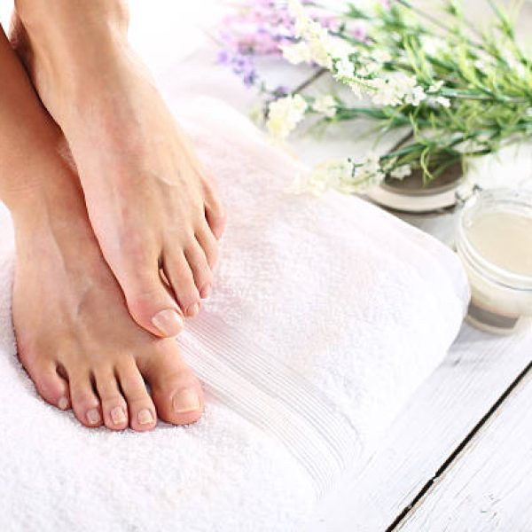 Beautiful feet of a woman during treatments.